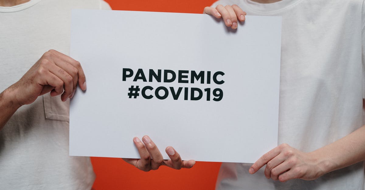 Incheon International Airport: Problem with immigration stamp - People Holding White Paper With Pandemic Covid19 Text Incheon International Airport: Problem with immigration stamp - People Holding White Paper With Pandemic Covid19 Text
