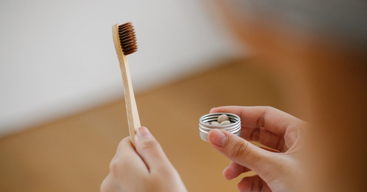 India converter 110v to 220v for Dental appliances - Unrecognizable female with wooden toothbrush and heap of toothpaste tablets in hands standing in bathroom on blurred background during hygienic routine India converter 110v to 220v for Dental appliances - Unrecognizable female with wooden toothbrush and heap of toothpaste tablets in hands standing in bathroom on blurred background during hygienic routine
