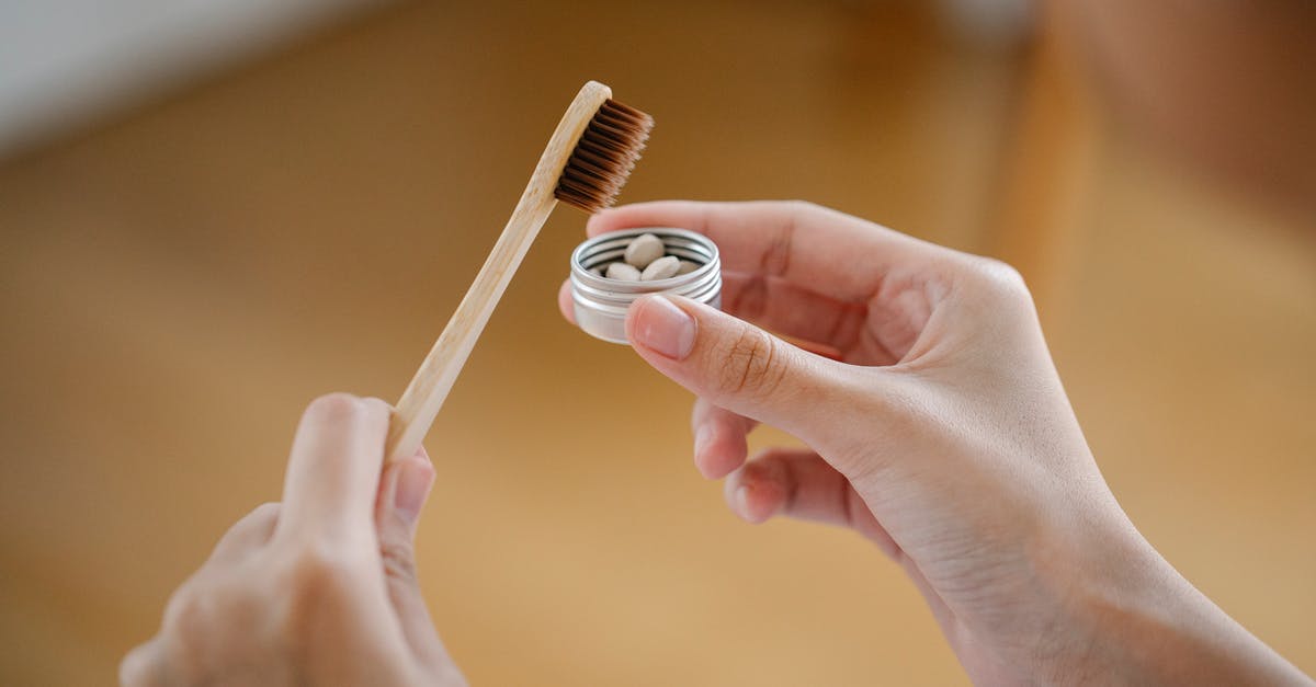 India converter 110v to 220v for Dental appliances - Hands of anonymous female with wooden toothbrush and toothpaste tablets standing in bathroom on blurred background during everyday hygienic routine India converter 110v to 220v for Dental appliances - Hands of anonymous female with wooden toothbrush and toothpaste tablets standing in bathroom on blurred background during everyday hygienic routine