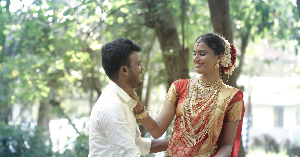 India Visa after marriage - Happy Couple Near the Tree India Visa after marriage - Happy Couple Near the Tree