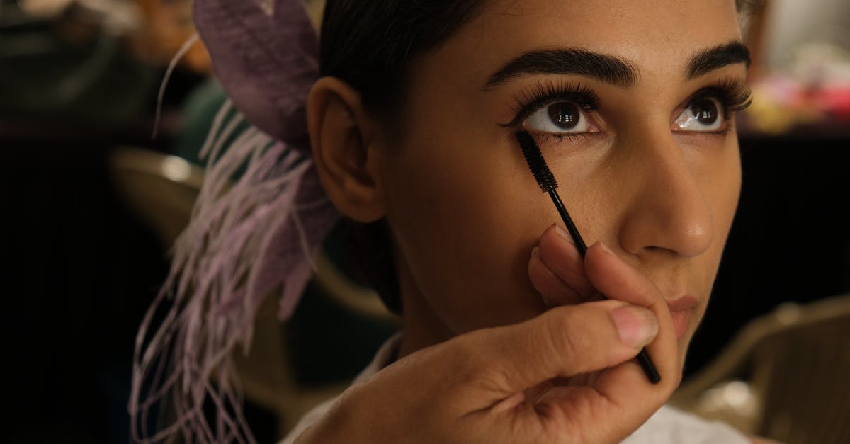 Indian eVisa Process - Calm ethnic model during makeup session Indian eVisa Process - Calm ethnic model during makeup session