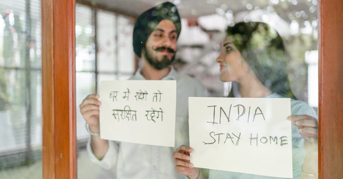 Indian National, Transit through Dublin - Optimistic young Indian couple staying at home during quarantine Indian National, Transit through Dublin - Optimistic young Indian couple staying at home during quarantine