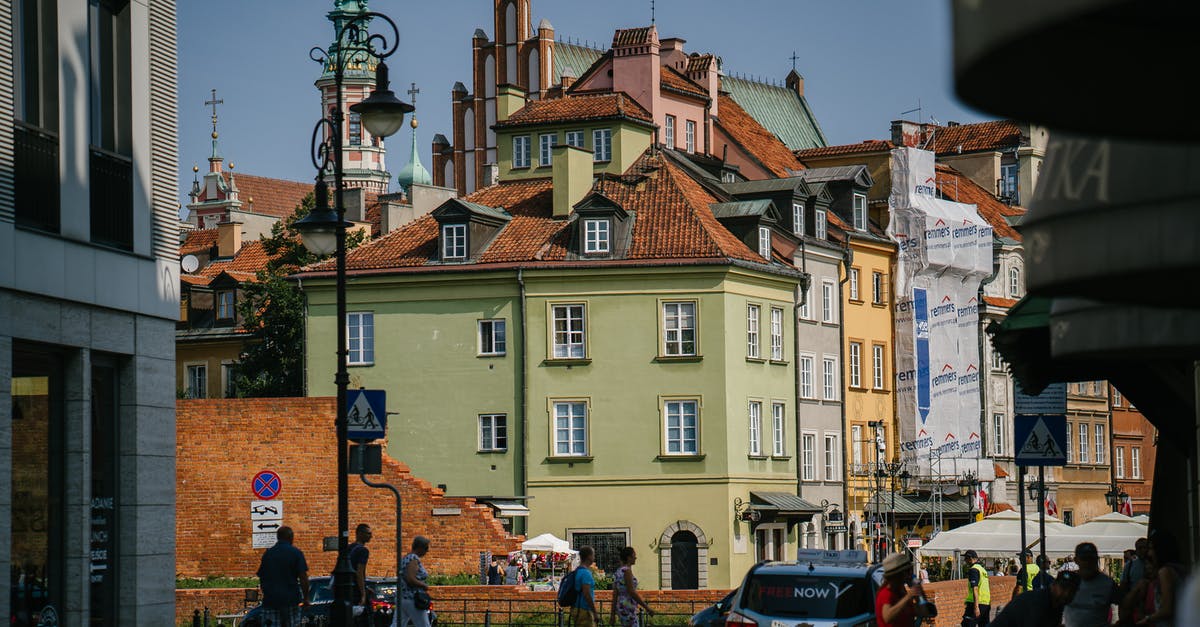 Indian traveling to Thailand with residence in Europe - Cozy residential buildings on busy street Indian traveling to Thailand with residence in Europe - Cozy residential buildings on busy street