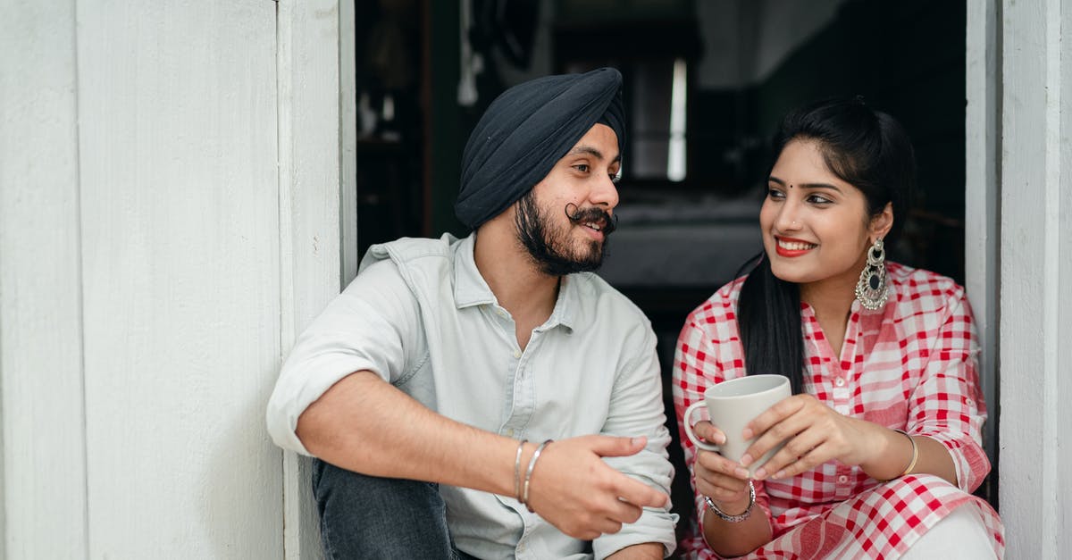Indian Visa -- when does 180 days countdown start - Positive Indian spouses in casual outfits sharing interesting stories while drinking morning coffee on doorstep of house Indian Visa -- when does 180 days countdown start - Positive Indian spouses in casual outfits sharing interesting stories while drinking morning coffee on doorstep of house