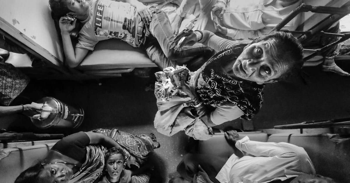 Indian waitlisted train tickets - Grayscale Photography of Group of Person Indian waitlisted train tickets - Grayscale Photography of Group of Person