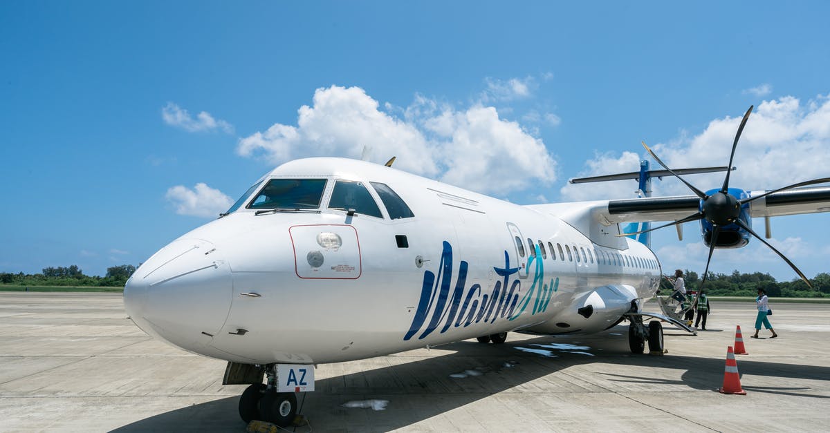 Infant boarding - White and Blue Airplane Under Blue Sky Infant boarding - White and Blue Airplane Under Blue Sky