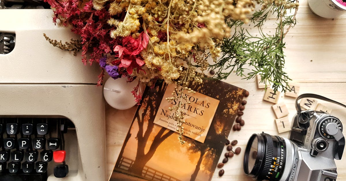 Information on month old flights - Bunch of flowers and book arranged on wooden table with vintage typewriter and camera Information on month old flights - Bunch of flowers and book arranged on wooden table with vintage typewriter and camera