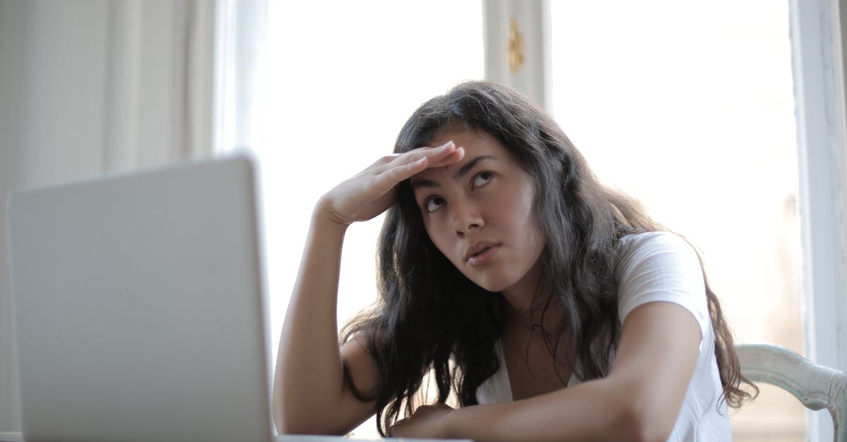 In-room TV has a USB port, but the provided remote doesn't have buttons for it. Can I use a universal remote to solve the problem during my next trip? [closed] - Irritated ethnic female entrepreneur in casual wear sitting at table with netbook and touching head while waiting for internet connection during remote work