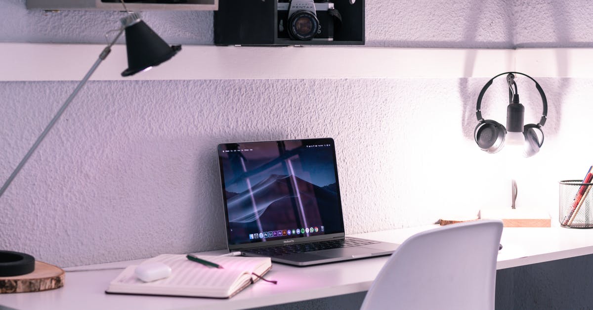 Interlining: How is responsibility distributed in case of a missed connection? [duplicate] - Modern convenient workplace with laptop and notebook