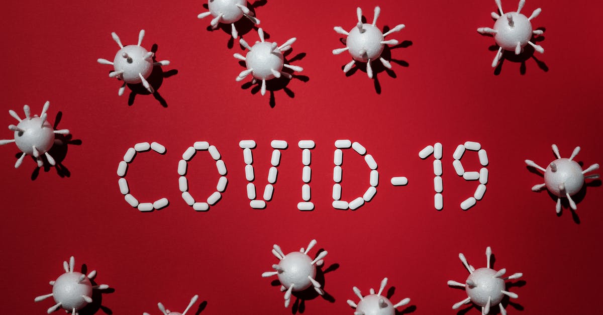 International Phone Numbers in Cell - Concept Of Covid-19 In Red Background International Phone Numbers in Cell - Concept Of Covid-19 In Red Background