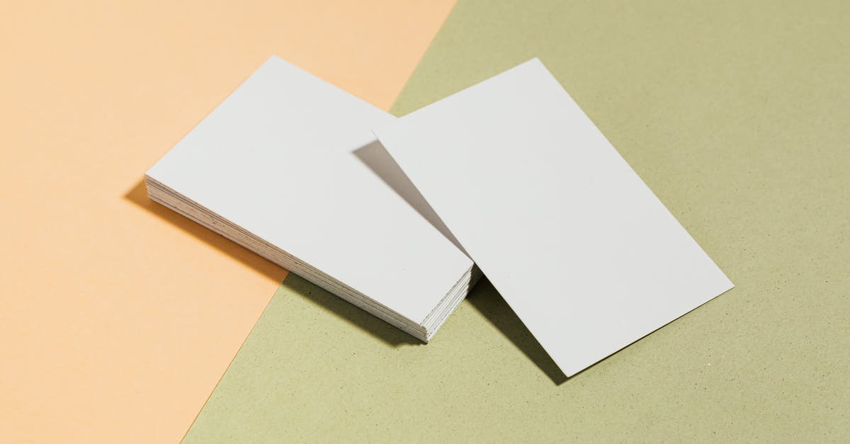 International SIM cards - White Printer Paper on Brown Table International SIM cards - White Printer Paper on Brown Table