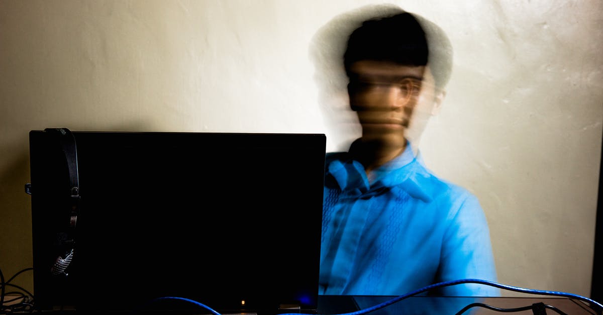 Internet speed in Nha Trang Vietnam? - Exhausted man working on laptop in office Internet speed in Nha Trang Vietnam? - Exhausted man working on laptop in office
