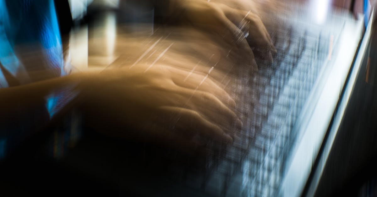 Internet speed in Nha Trang Vietnam? - From above of crop anonymous person typing on keyboard of laptop in long exposure Internet speed in Nha Trang Vietnam? - From above of crop anonymous person typing on keyboard of laptop in long exposure