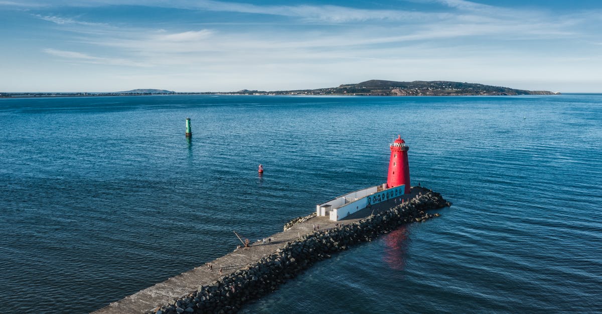 Ireland Transit Visa when flying from IND - Abu Dhabi - Dublin - US - Red and White Lighthouse Near Body of Water Ireland Transit Visa when flying from IND - Abu Dhabi - Dublin - US - Red and White Lighthouse Near Body of Water