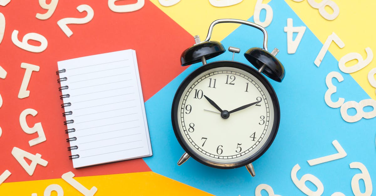 Is 1 hour layover enough in Dusseldorf? - Alarm Clock Lying on Multicolored Surface Is 1 hour layover enough in Dusseldorf? - Alarm Clock Lying on Multicolored Surface