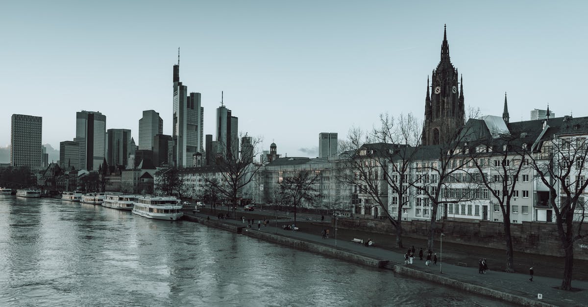 Is 1h25m enough to connect at Frankfurt am Main Airport? - Buildings Near a River with Ferry Boats Is 1h25m enough to connect at Frankfurt am Main Airport? - Buildings Near a River with Ferry Boats