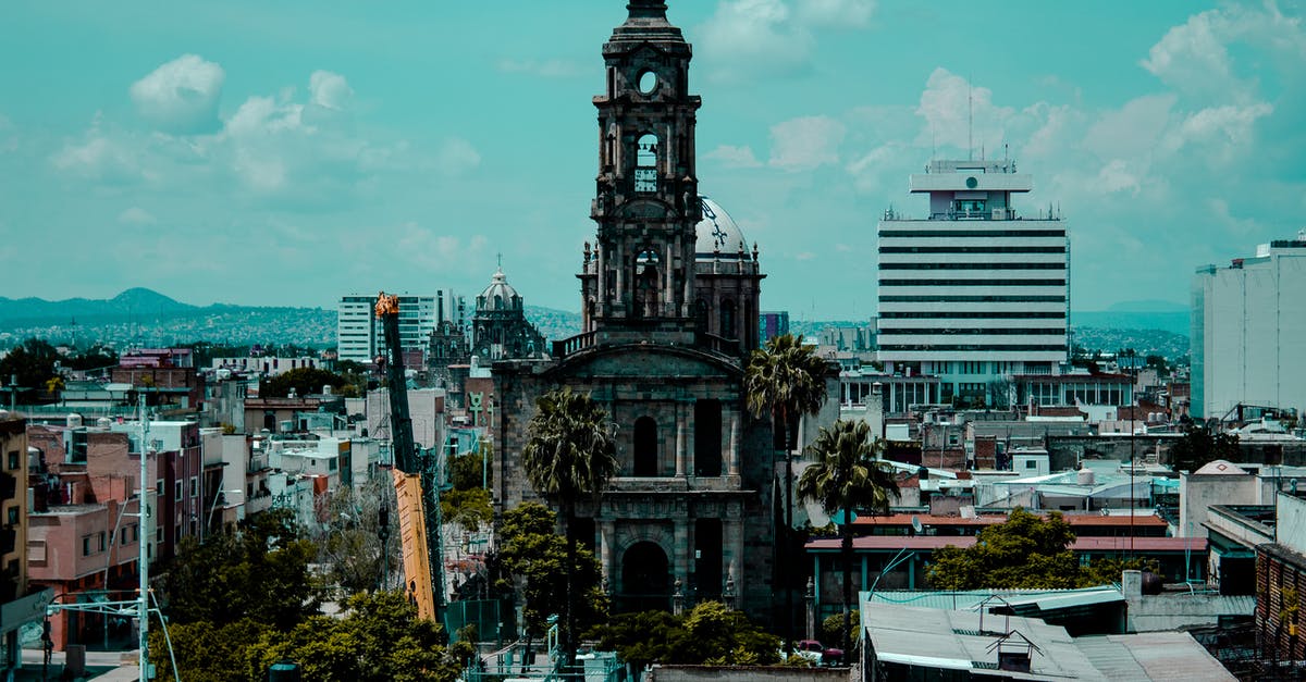is 55 minutes enough time to connect in Guadalajara from Mexico City to Sacramento,Ca? - Gray Concrete Building Under the Blue Sky is 55 minutes enough time to connect in Guadalajara from Mexico City to Sacramento,Ca? - Gray Concrete Building Under the Blue Sky