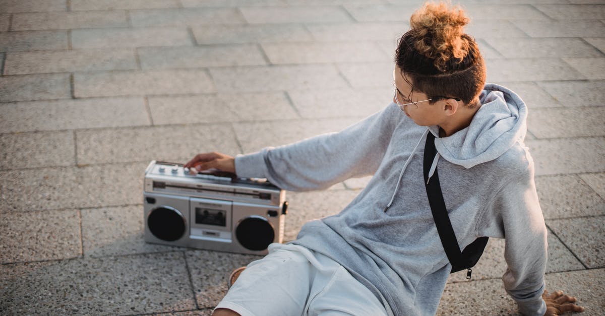 is 55 minutes enough time to connect in Guadalajara from Mexico City to Sacramento,Ca? - Trendy young ethnic guy listening to music with boombox on street is 55 minutes enough time to connect in Guadalajara from Mexico City to Sacramento,Ca? - Trendy young ethnic guy listening to music with boombox on street