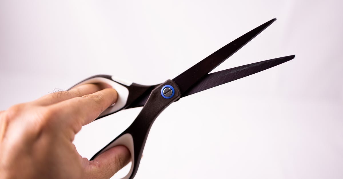Is a 105 cm steel wire a suspect item in a hand baggage? - Scissors in hand of crop person Is a 105 cm steel wire a suspect item in a hand baggage? - Scissors in hand of crop person