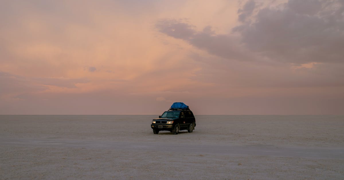 is a 4WD required in practice to drive down Waipio Valley road? - Lonely black automobile driving through empty sandy desert against cloudy sky in sunset is a 4WD required in practice to drive down Waipio Valley road? - Lonely black automobile driving through empty sandy desert against cloudy sky in sunset