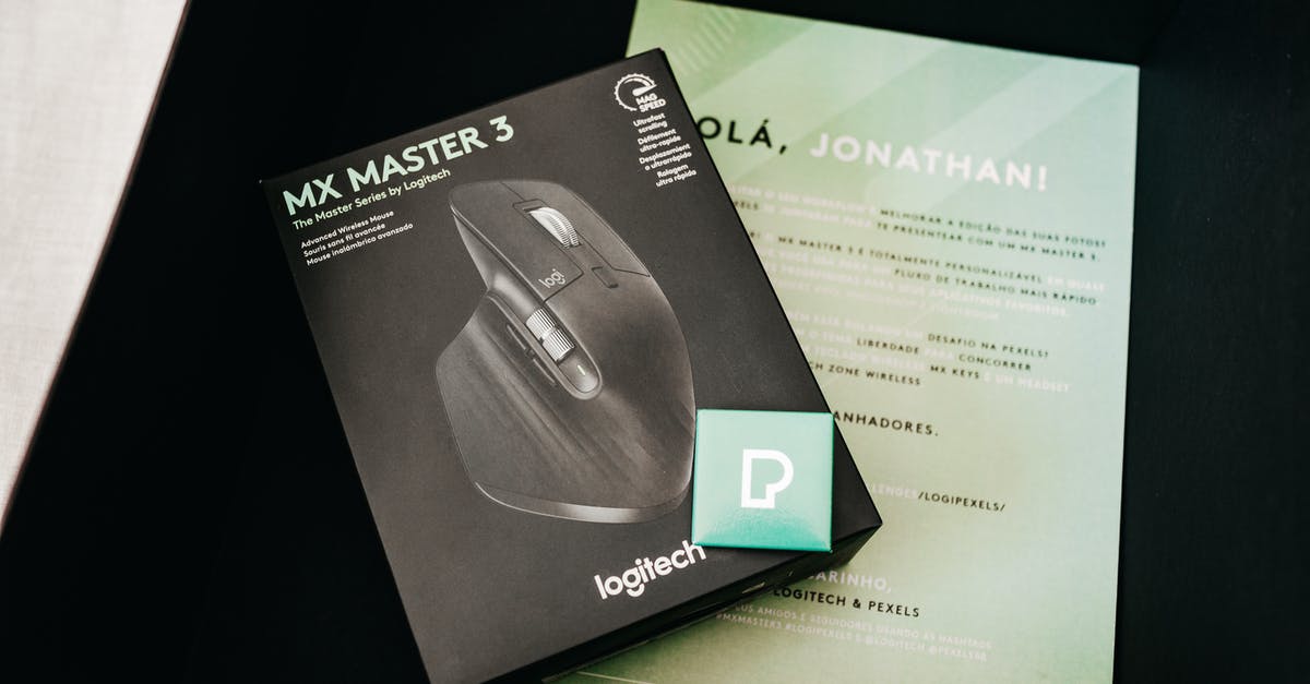 Is a certified copy of my marriage certificate sufficient proof of name change when traveling to the US? - Box with photo of game mouse near certificate