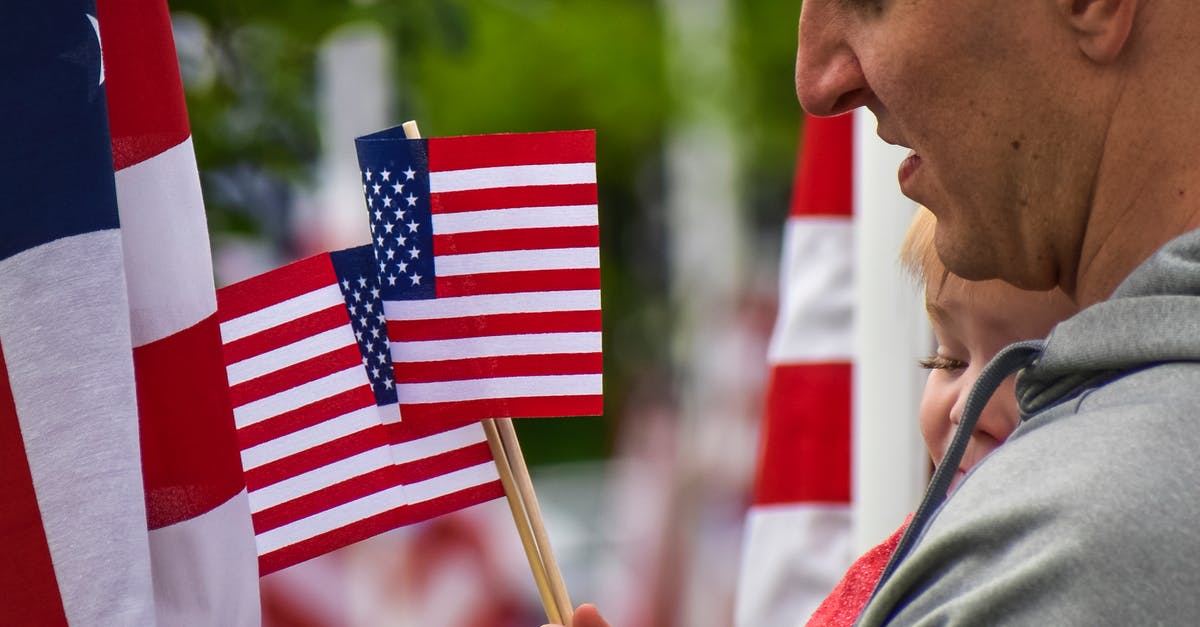 Is a child holding a UK passport issued in 2015 eligible for Visa Waiver Program to the US? [closed] - A Person Holding a Flag