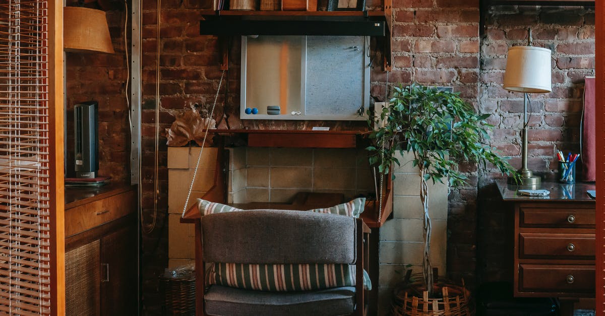 Is a holder of a German unlimited residence permit allowed to work in the UK? [closed] - Interior of stylish work zone in cozy apartment