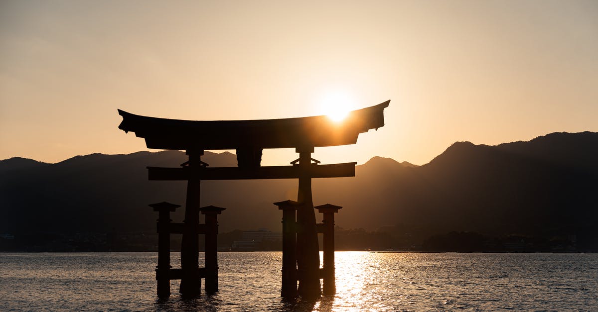 Is a Japan transit visa required for a 19-hour layover at Haneda? - 
A Silhouette of the Itsukushima Shrine in Japan