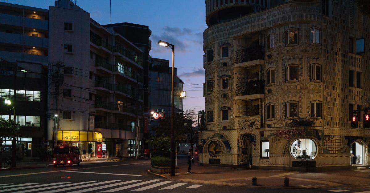 Is a transit visa required at Narita, Japan if you're on a multi city itinerary? - Brown Concrete Building during Night Time Is a transit visa required at Narita, Japan if you're on a multi city itinerary? - Brown Concrete Building during Night Time