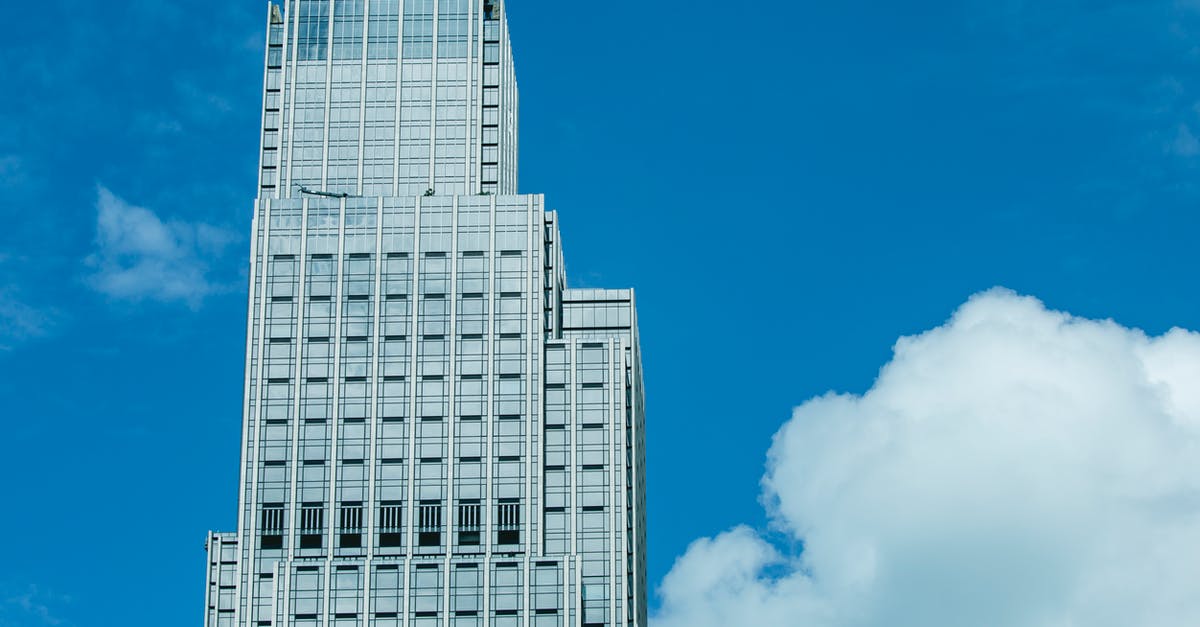 Is American Express widely accepted in Hong Kong? - Architectural Glass Buiulding