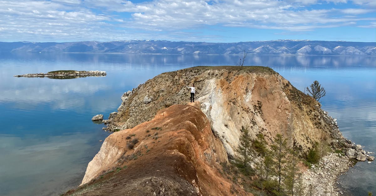 Is an 8 hour layover in Russia (SVO) long enough to leave the airport? - Free stock photo of baikal, cliff, high