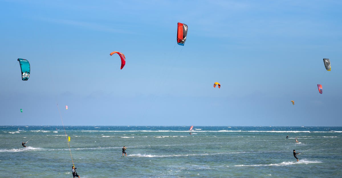 Is an Australian required to fly in and out of Brazil to activate a tourist visa? - Anonymous people with kites surfing in waving sea under blue sky in summer sunny day Is an Australian required to fly in and out of Brazil to activate a tourist visa? - Anonymous people with kites surfing in waving sea under blue sky in summer sunny day