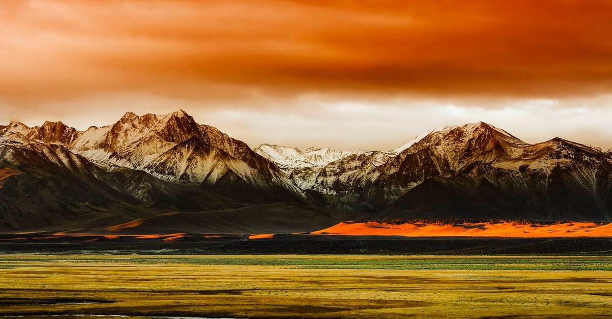 Is an Australian travel insurance company right not to honor a cancellation claim even if I can't enter the country while pregnant? - Landscape Photo of Mountain