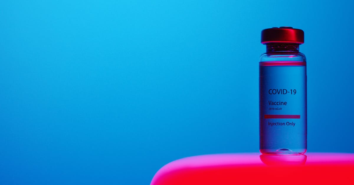 Is an EU covid pass with two doses of Sputnik and one dose of Pfizer valid? - A Close-Up View of a Covid-19 Vaccine Vial on Blue Background Is an EU covid pass with two doses of Sputnik and one dose of Pfizer valid? - A Close-Up View of a Covid-19 Vaccine Vial on Blue Background