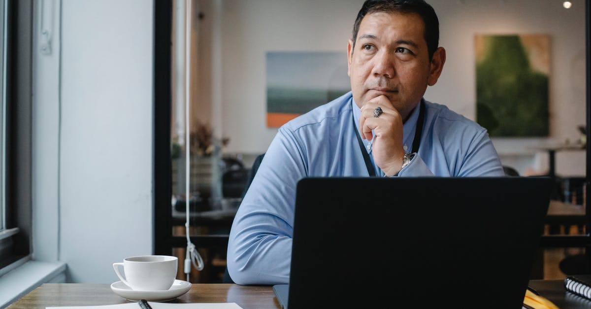Is busticket4.me reliable? - Thoughtful ethnic businessman using laptop while working in office Is busticket4.me reliable? - Thoughtful ethnic businessman using laptop while working in office