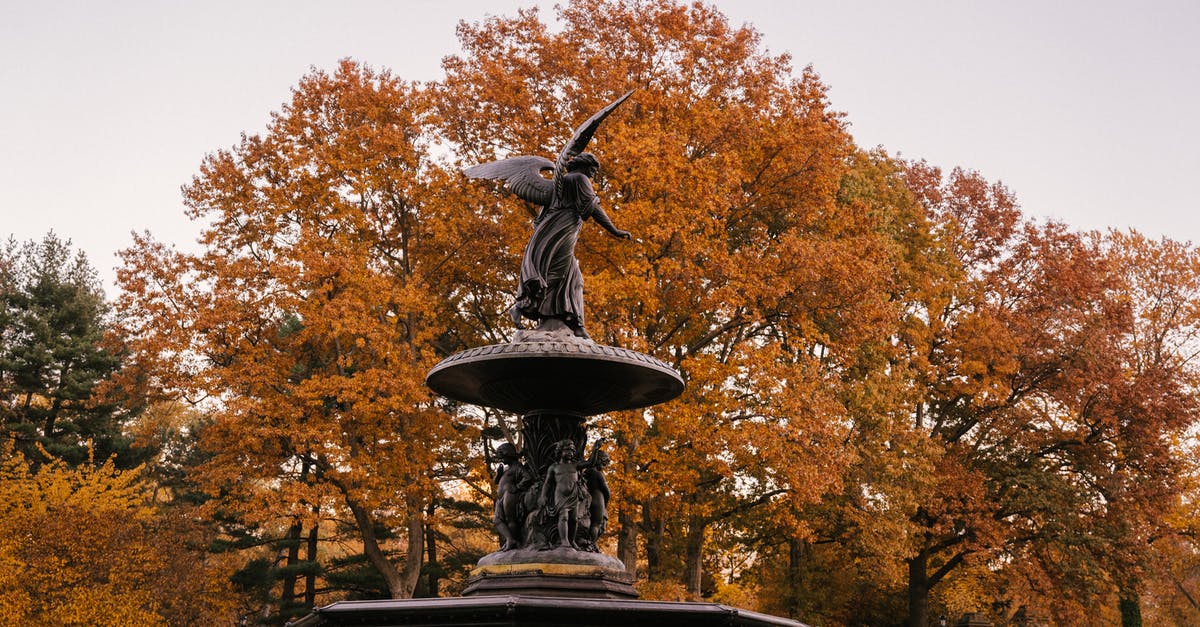 Is early April a peak tourist season for national park areas in the southwest US? - Fragment of Bethesda Fountain with Angel of the Waters statue placed in Central Park in New York City in America in autumn time