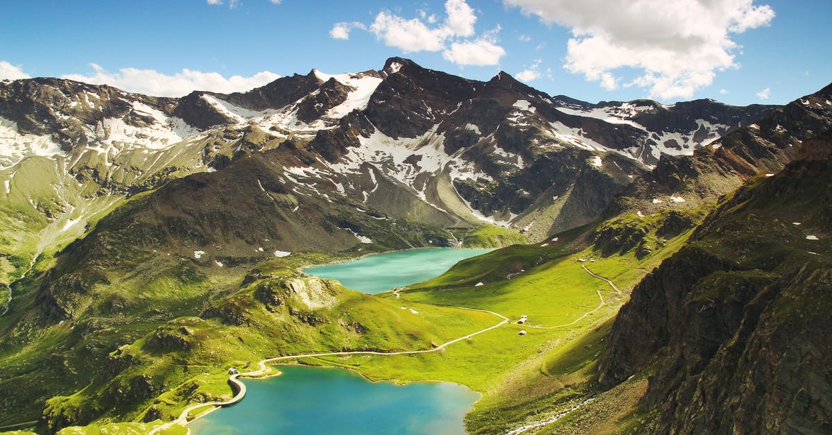 Is English understood / spoken around the Italian Lakes? - Aerial View of Mountain and Body of Water Is English understood / spoken around the Italian Lakes? - Aerial View of Mountain and Body of Water