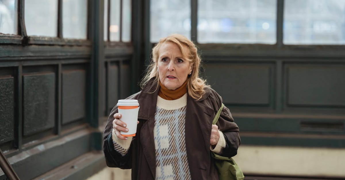 Is fear of having drugs planted in my bag enroute to Malaysia justified? - Scared woman with coffee to go in building Is fear of having drugs planted in my bag enroute to Malaysia justified? - Scared woman with coffee to go in building
