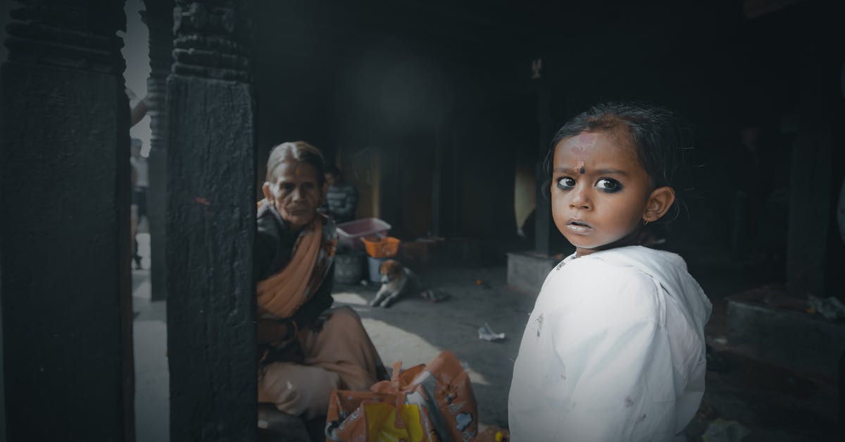 Is fear of having drugs planted in my bag enroute to Malaysia justified? - Scared ethnic child with makeup standing near grandma with crossed legs in city in daytime Is fear of having drugs planted in my bag enroute to Malaysia justified? - Scared ethnic child with makeup standing near grandma with crossed legs in city in daytime