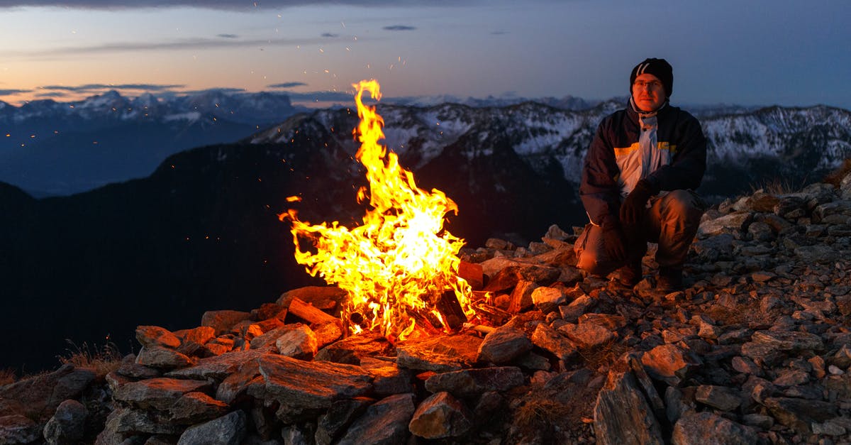 Is free camping permitted in Japan? - Person Wearing Brown Leather Boots Near Bonfire Is free camping permitted in Japan? - Person Wearing Brown Leather Boots Near Bonfire