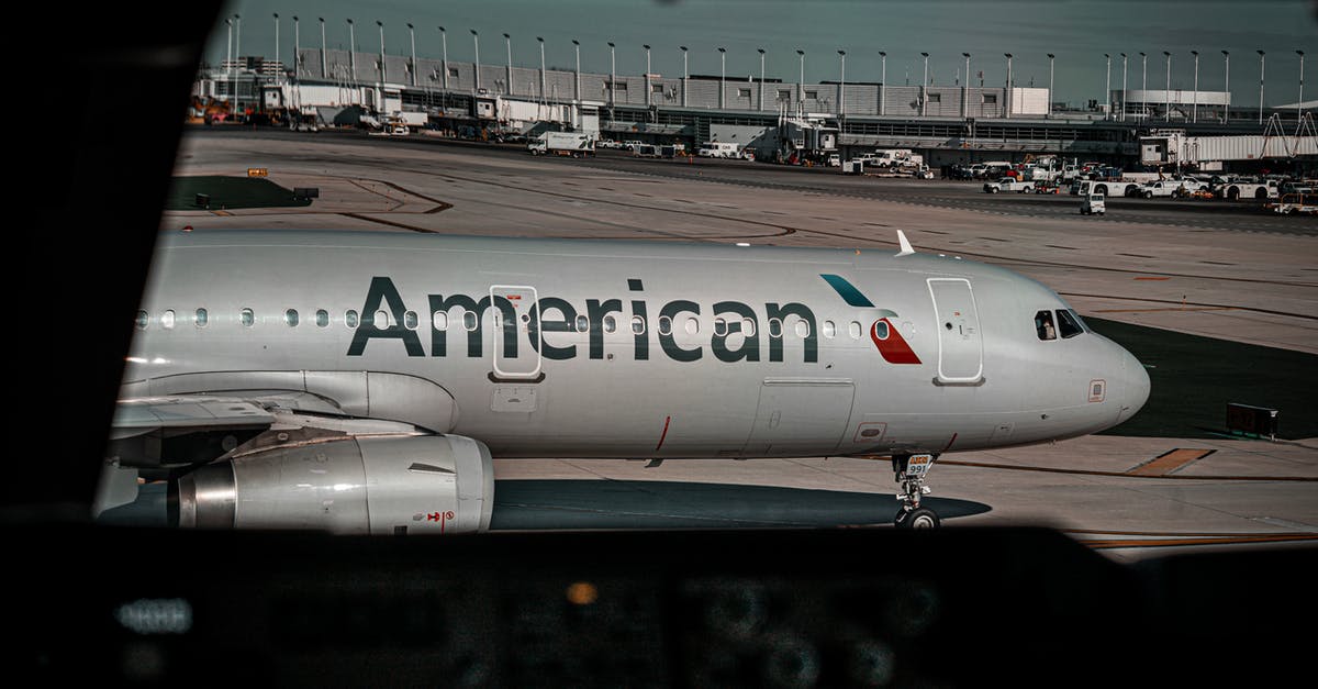 Is fuel dumping a peculiarity of American airlines? - An American Airline Passenger Plane in the Airport Is fuel dumping a peculiarity of American airlines? - An American Airline Passenger Plane in the Airport