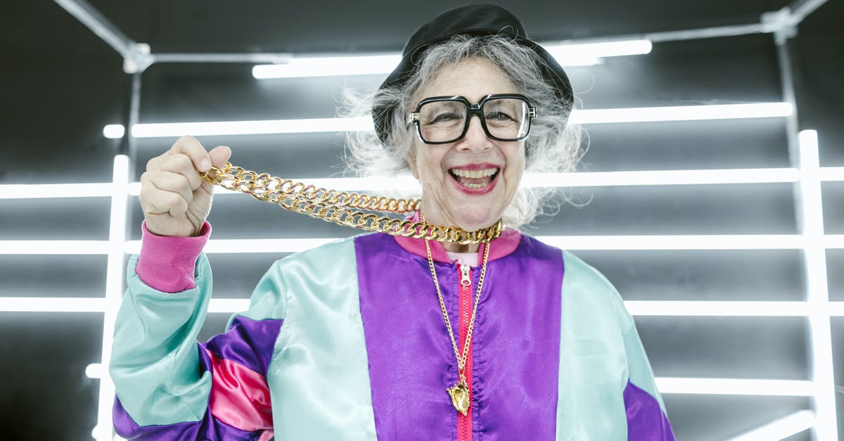 Is Global Entry active immediately after the interview? - Woman in Purple and Pink Long Sleeve Jacket Holding Gold Necklace Is Global Entry active immediately after the interview? - Woman in Purple and Pink Long Sleeve Jacket Holding Gold Necklace