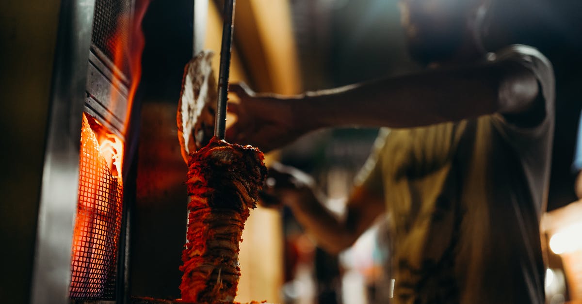 Is Indian food easily available in European countries? - Person in Red and Black Dress Holding Stick Is Indian food easily available in European countries? - Person in Red and Black Dress Holding Stick