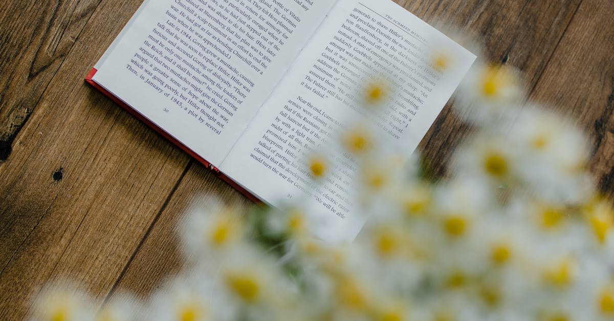 Is it a problem that visa was printed next to already stamped page? - A Book on Wooden Surface Is it a problem that visa was printed next to already stamped page? - A Book on Wooden Surface