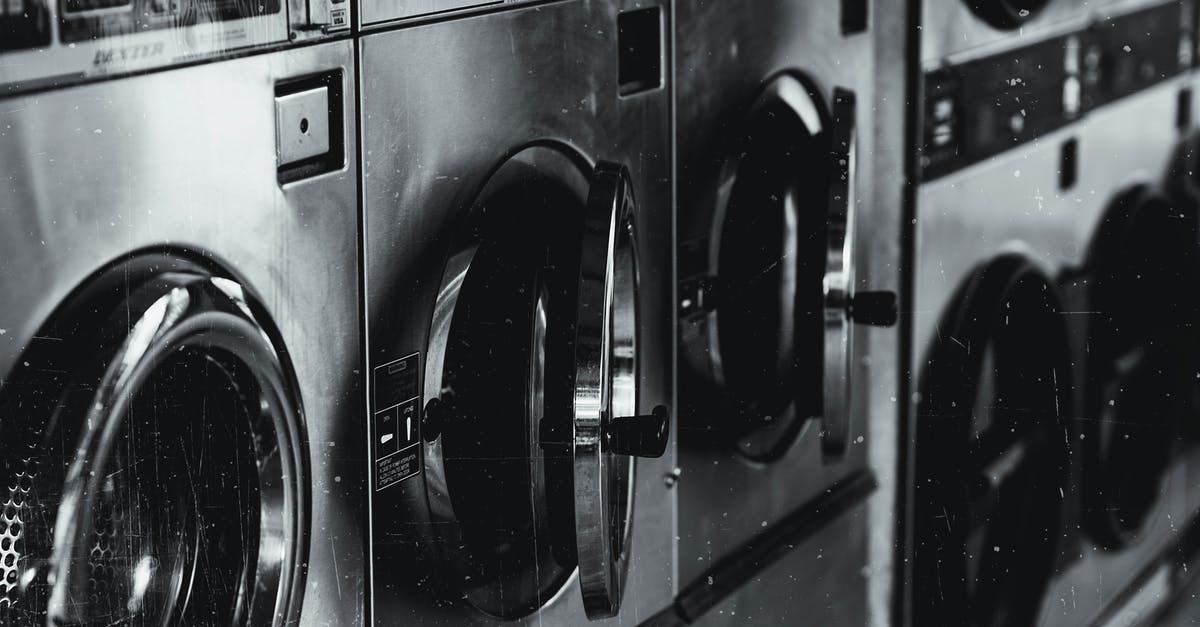 Is it a reasonable assumption that larger US hotels will have laundry facilities? - Grayscale Photo of Washing Machine Is it a reasonable assumption that larger US hotels will have laundry facilities? - Grayscale Photo of Washing Machine