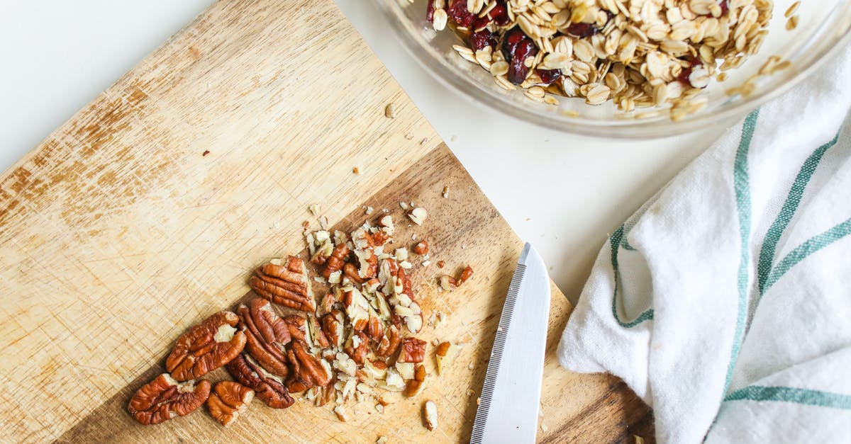 Is it allowed to bring nuts and raisins to Colombia? - Photo Of Chopped Pecans On Wooden Chopping Board Is it allowed to bring nuts and raisins to Colombia? - Photo Of Chopped Pecans On Wooden Chopping Board