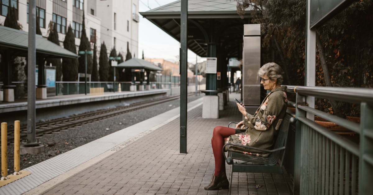 Is it allowed to carry "a knife" or "a pepper spray" while traveling by road in the Schengen area as a woman? - Woman in Brown Coat Sitting on Bench Is it allowed to carry "a knife" or "a pepper spray" while traveling by road in the Schengen area as a woman? - Woman in Brown Coat Sitting on Bench
