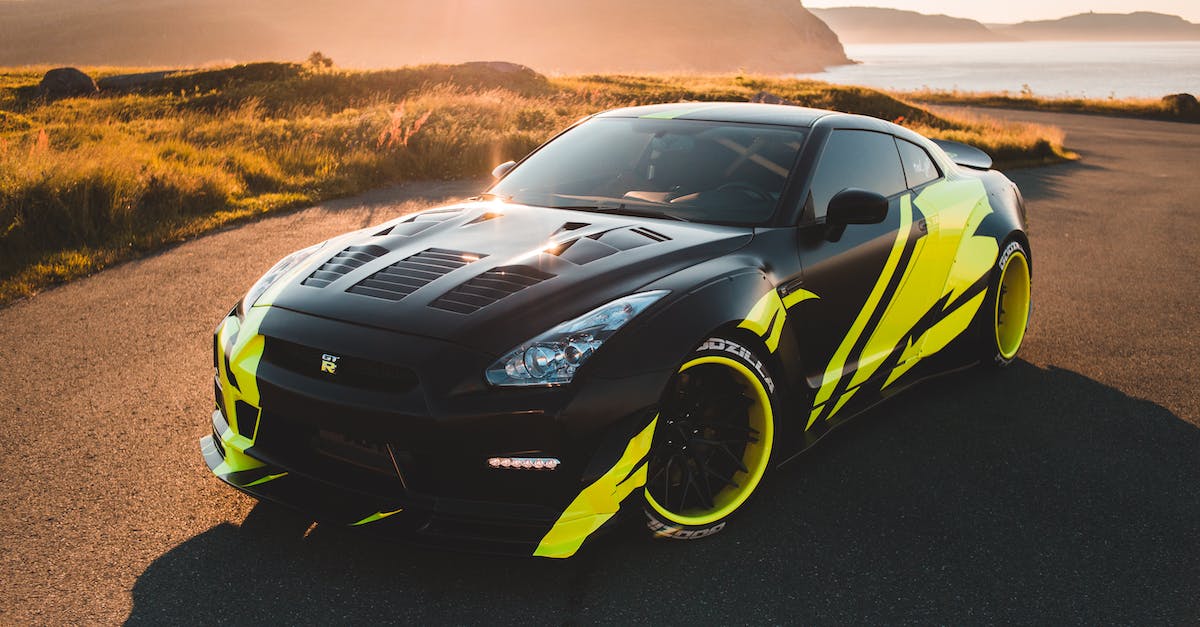 Is it feasible to do the Great Lakes Circle Tour (Lake Michigan) in 3.5 days (Car Trip)? - Shiny sport car parked on peaceful grassy coast Is it feasible to do the Great Lakes Circle Tour (Lake Michigan) in 3.5 days (Car Trip)? - Shiny sport car parked on peaceful grassy coast
