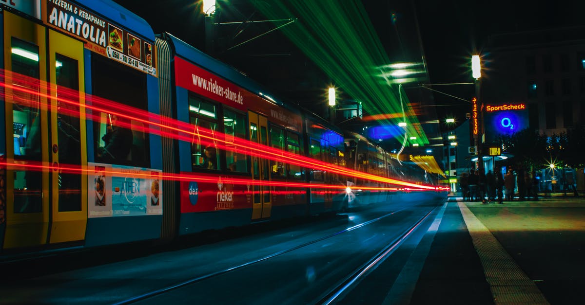 Is it frequent that a tomato is thrown at a tram in Berlin/Germany? - Time-Lapse Photography of Tram During Nighttime Is it frequent that a tomato is thrown at a tram in Berlin/Germany? - Time-Lapse Photography of Tram During Nighttime