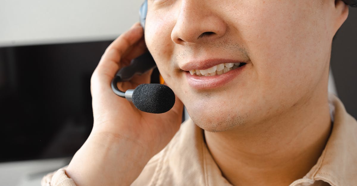Is it generally true that Japanese people are more reluctant to help Asian compared to Western foreigners? [closed] - Close-Up Photo of an Operator Working